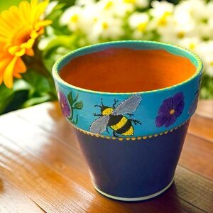 Hand crafted upcycled BEE Terra cotta pot painted blue purple yellow dots floral